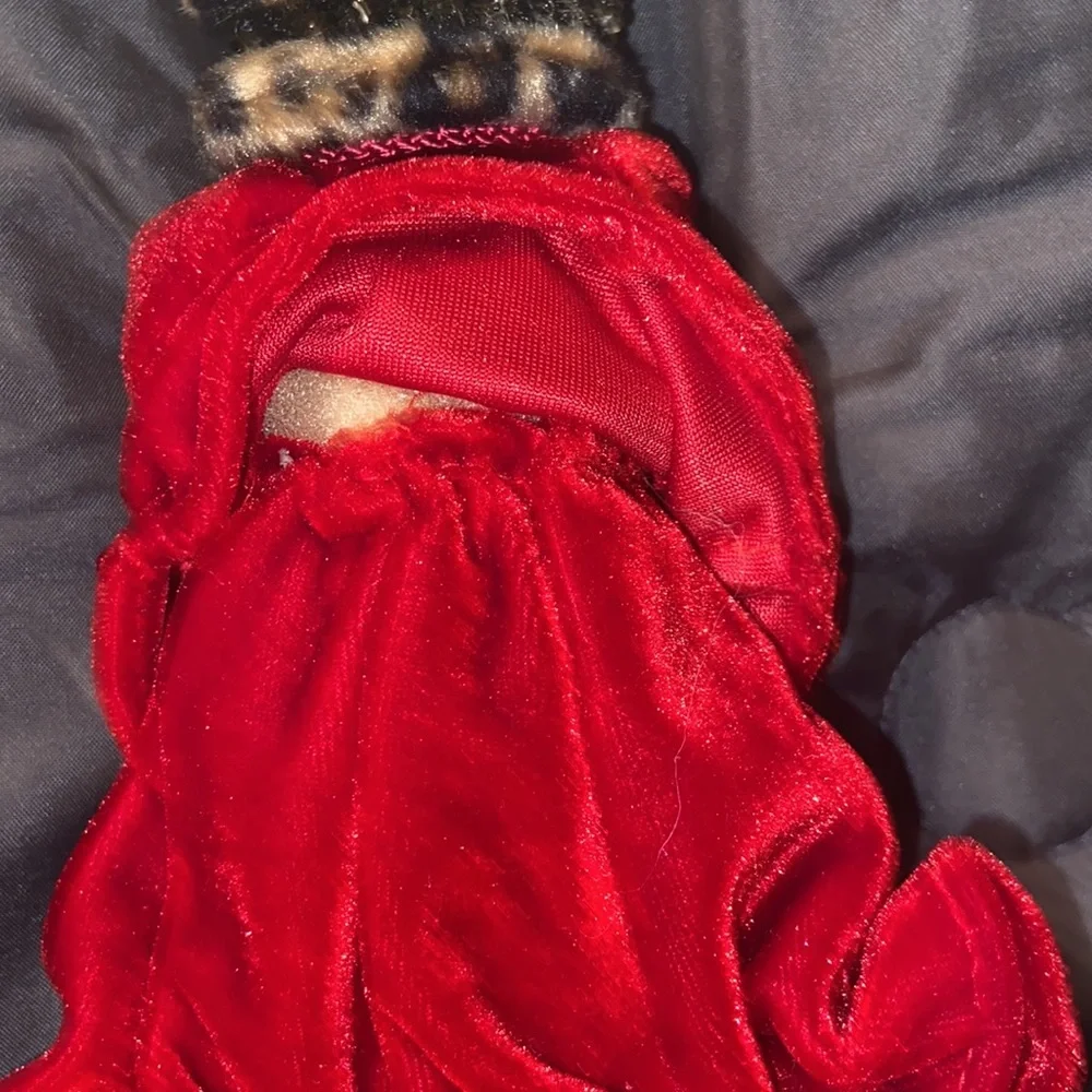 Vintage African American doll ornament with red velvet and leopard fur purse